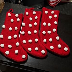Red Christmas Stockings with White Pom Poms
